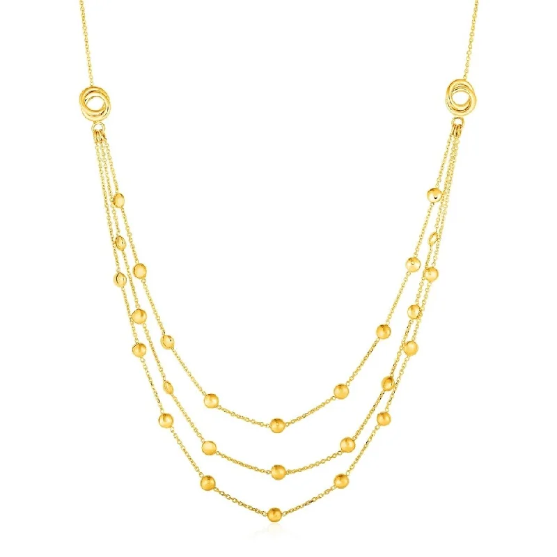 Worn medallion necklaces-Station Necklace with Three Chains and Love Knots in 14k Yellow Gold