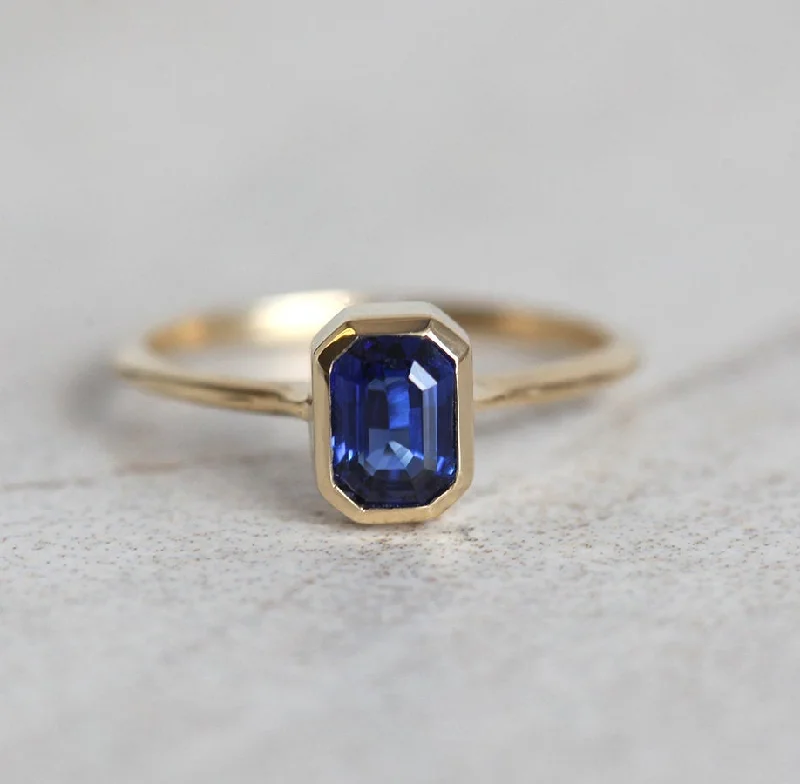 Sculptural engagement rings-Gul Emerald Cut Sapphire Solitaire Ring