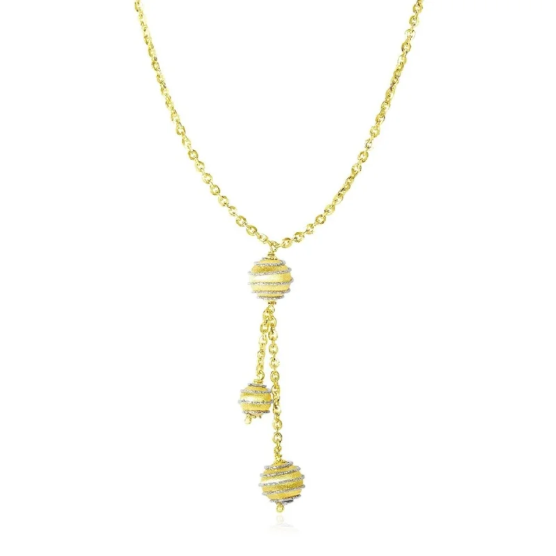 Fiber tassel necklaces-14k Two-Tone Gold Lariat Style Necklace with Coil Wrapped Balls