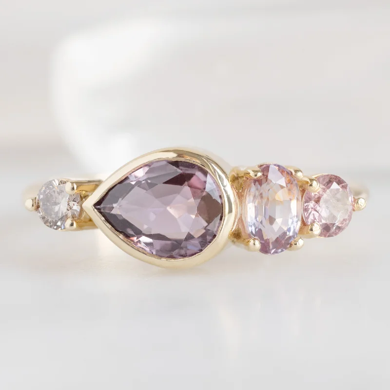 Asymmetrical engagement rings-The Watercolor Ring | 1.27ct Pear Magenta Sapphire in 14K Yellow Gold